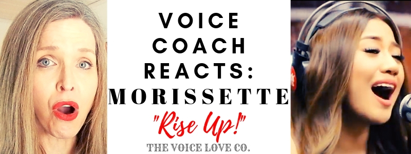 Veteran voice coach, Christi Bovee, sits with mouth agape and eyes wide as Morissette, Asia's Phoenix, sings into a microphone. Voice Coach Reacts: Morissette singing "Rise Up!"