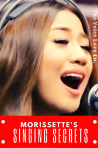 Morissette Amon, Asia's Phoenix, sings into a microphone. Morissette's Singing Secrets here at The Voice Love Co.